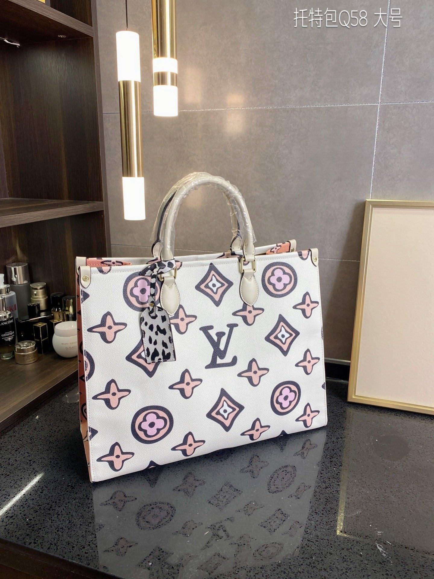 LV ONTHEGO MONOGRAM 069 LUXURYSTEPSCO