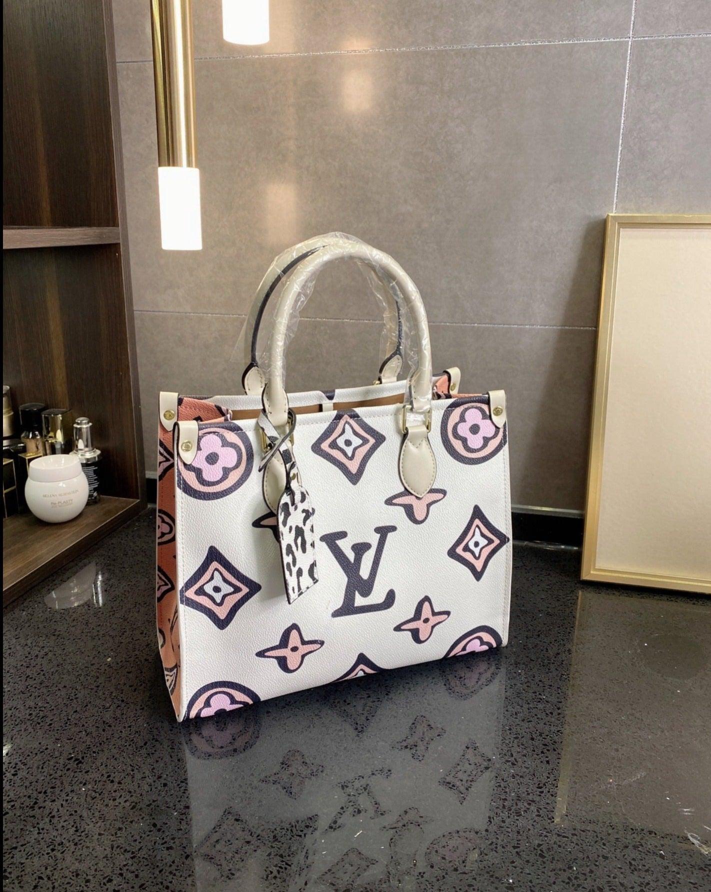 LV ONTHEGO MONOGRAM 069 LUXURYSTEPSCO