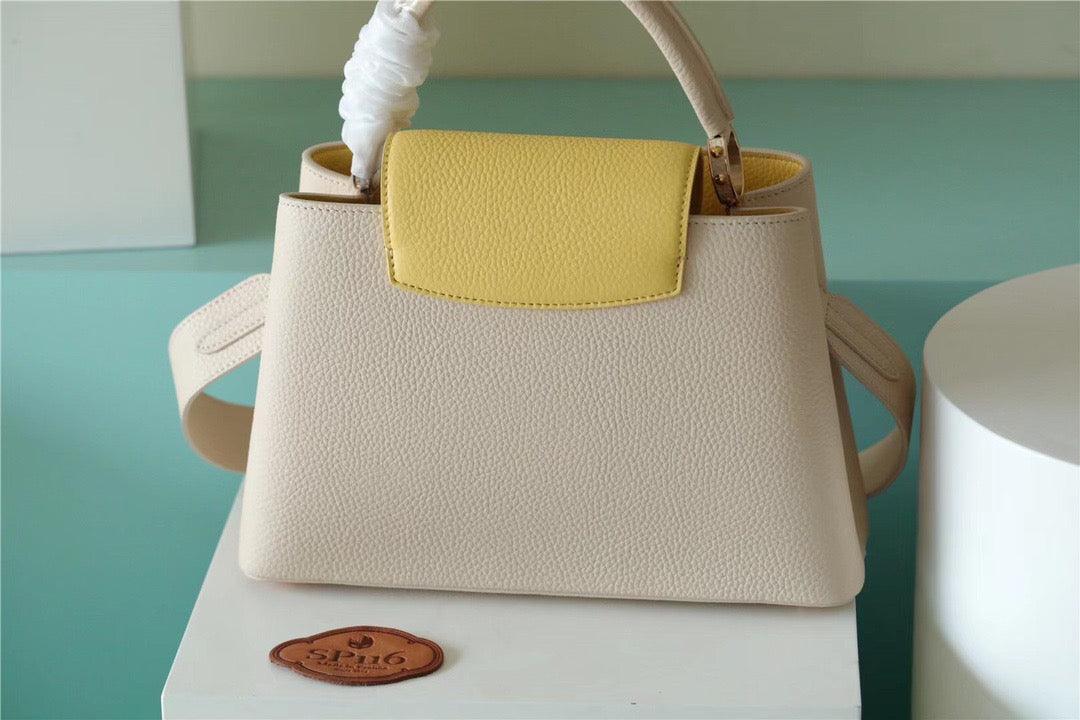 LV Capucines MM Taurillon Creme Beige/ Plume Yellow Berlingot For Women, Women’s Bags, Shoulder And Crossbody Bags 12.4in/31.5cm LV M59883