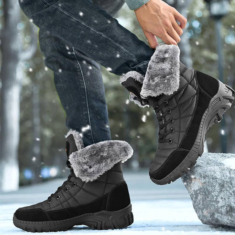 a person wearing winter boots and a pair of winter boots