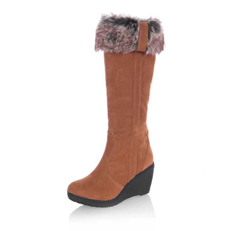 a women's boot with a fur lined heel